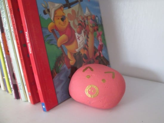 Pig painted rock as a book end.  Works great!